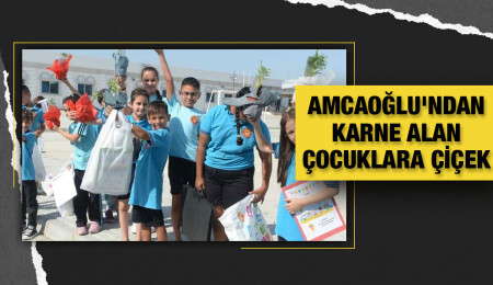 Hüseyin Amcaoğlu, çocuklara karne hediyesi mevsimlik çiçek hediye etti