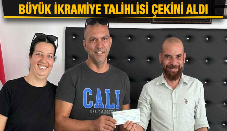 1.5 milyon TL kazanan talihli Ahmet Yeni, çekini aldı