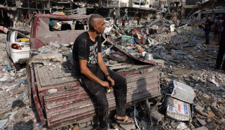 Gaza Workers Wrap Bodies in Shrouds in Bombed-Out Northern Gaza
