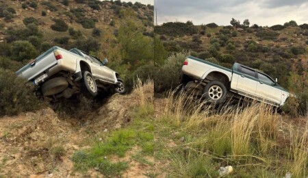 Arızalandığı için bankete park edilen araç, banketin çökmesiyle çalılıklara kaydı